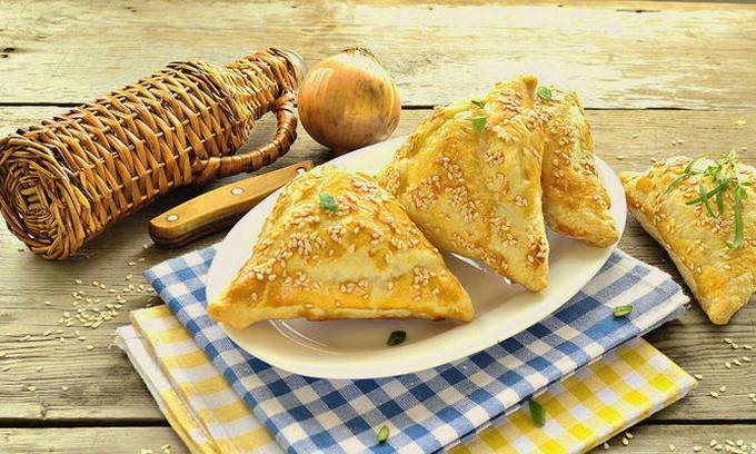 Samsa with pumpkin and meat in the oven