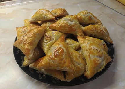 Samsa from ready-made puff pastry with chicken and potatoes