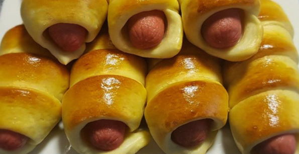 Sausages in puff frozen dough