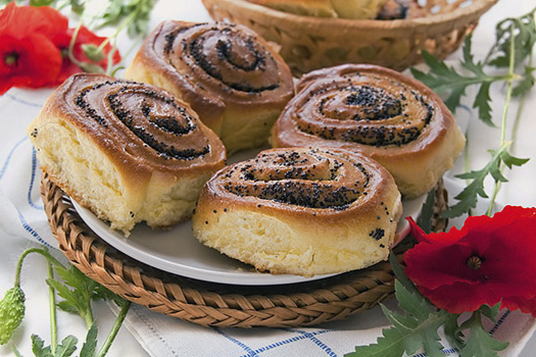 Buns with poppy seeds from yeast dough in the oven