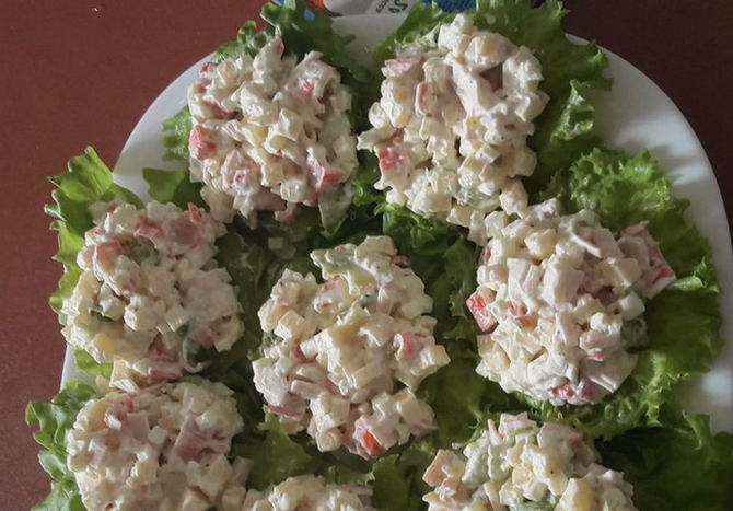 Chicken salad with crab sticks and pineapple