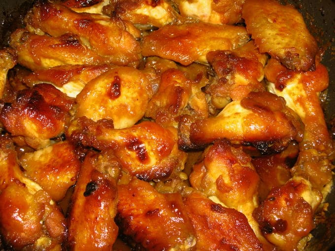 Wings in honey-soy sauce in a sleeve in the oven