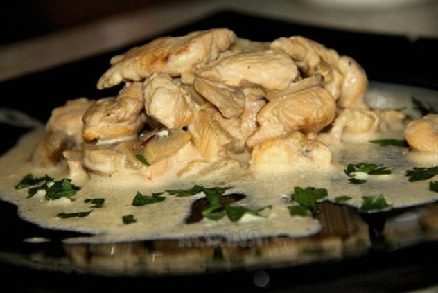 Chunks of turkey thigh in a pan