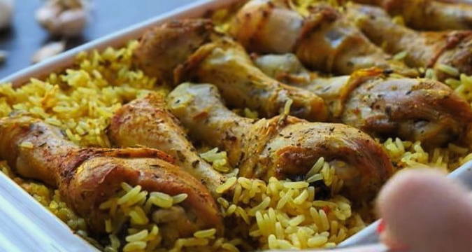 Pilaf with rice and chicken in the oven