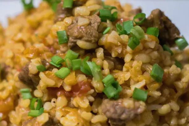 Bulgur pilaf with beef in a slow cooker