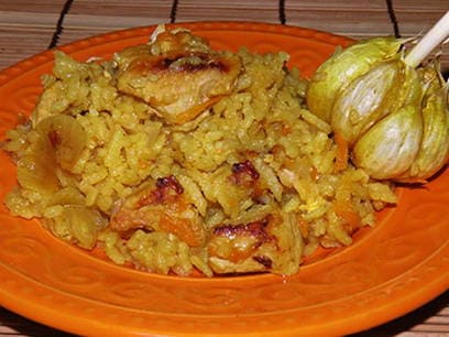 Crumbly pilaf with pork in a slow cooker