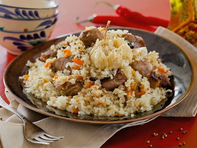 Pilaf with pork in a multicooker Polaris