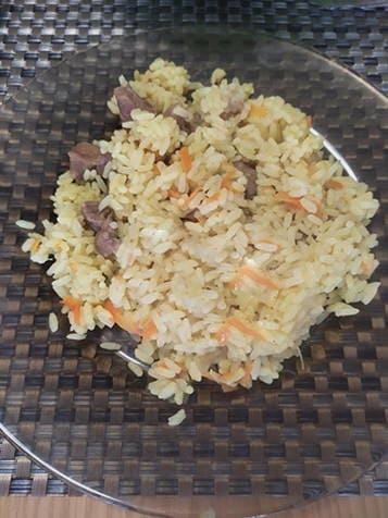 Pilaf with pork in a Redmond slow cooker