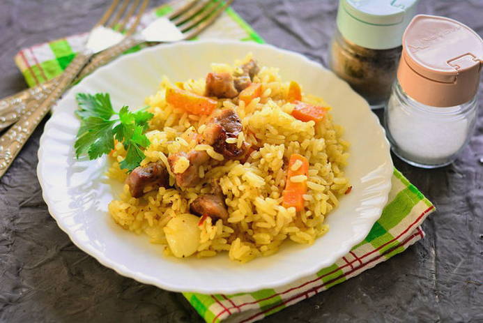 Pilaf with pork in a bag for roasting in the oven