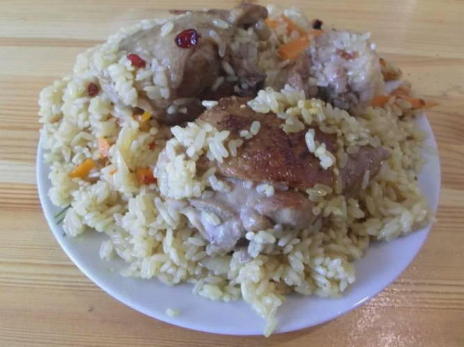 Pilaf with duck in a saucepan