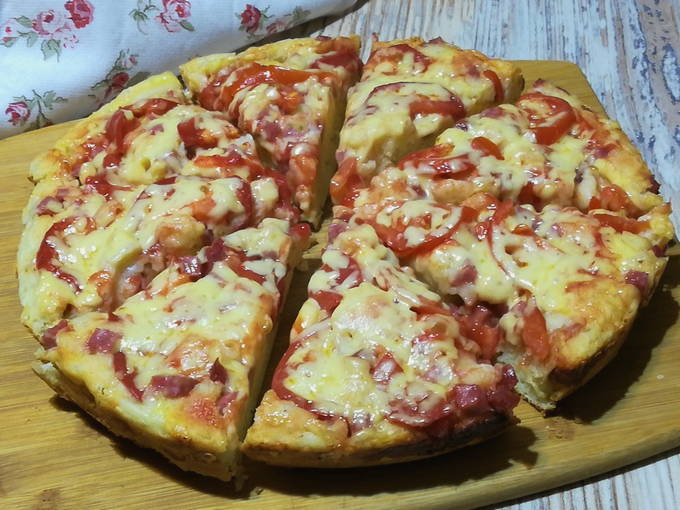 Pizza with sour cream without mayonnaise in a pan