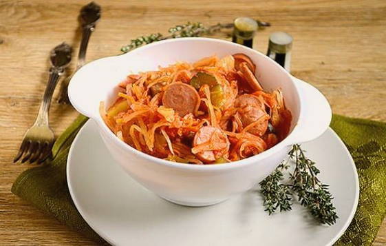 Solyanka with sauerkraut and sausages