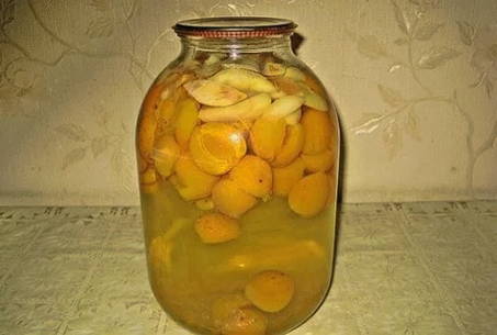 Apricot and apple compote in 3-liter jars for the winter