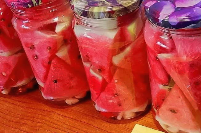 Watermelons in their own juice in jars for the winter