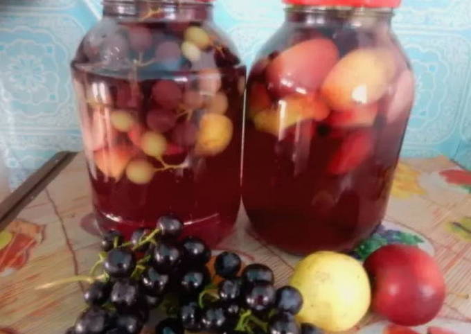 Pear, apple and grape compote for the winter in a 3-liter jar