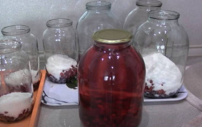 Red currant and cherry compote in a 3-liter jar for the winter