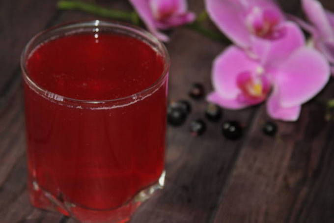 Blackcurrant and cherry compote in a 3 liter jar for the winter