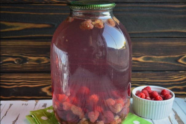 Pear and raspberry compote in a 3-liter jar for the winter