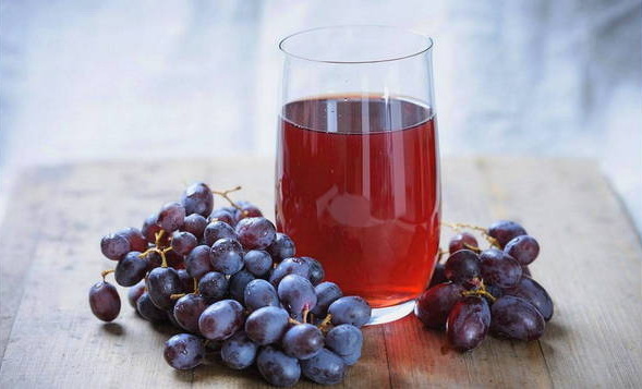 Compote of grapes and cherries in a 3 liter jar for the winter