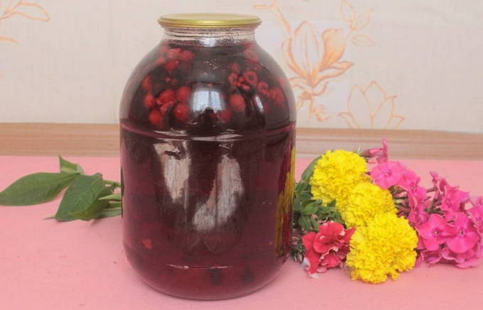 Raspberry and black currant compote in a 3 liter jar for the winter