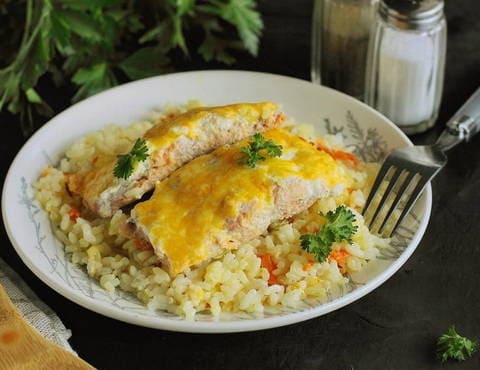 Pink salmon with rice in the oven